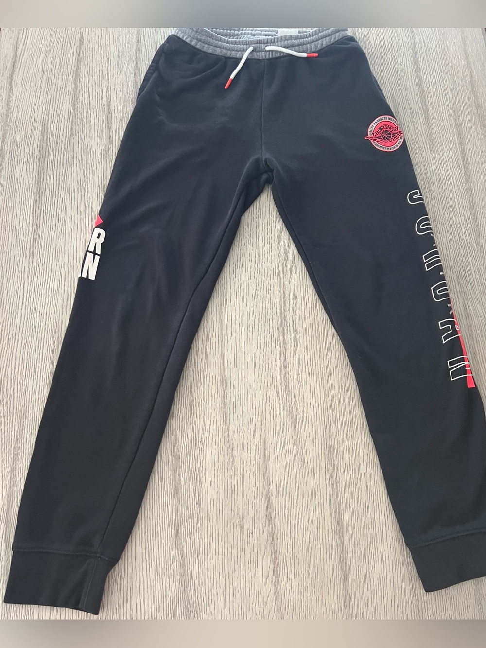 Jordan Boys Black Jogger Sweatpants with Red Logo and White Drawstring